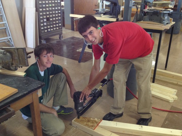 Students from Mr. Denaro's Woodworking Class build a part of the Santa Hut for the City of Breese.