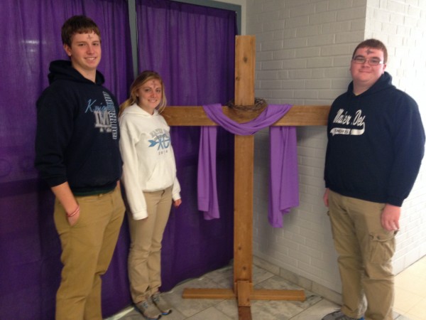 MD students prepare for the Lenten season with a cross in front of the office.