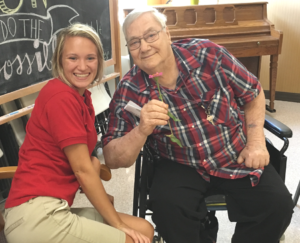 Melanie Holtgrave is pictured with a resident of Aviston Countryside Manor with whom she created poetry while attending a workshop led by Mr. Gary Glazer of the Alzheimer’s Poetry Project.